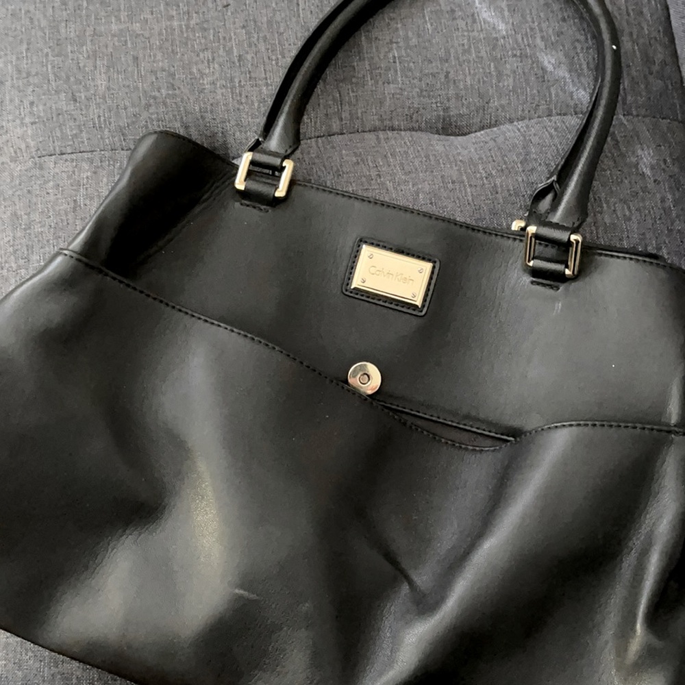 Woman’s Calvin Klein purse.